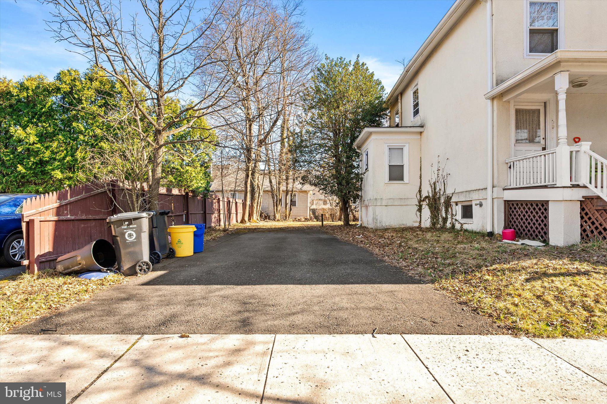 75 Patton Avenue, Unit 1 Princeton, NJ 08540 - Photo 3 of 20 a view of a white house with a sink and yard