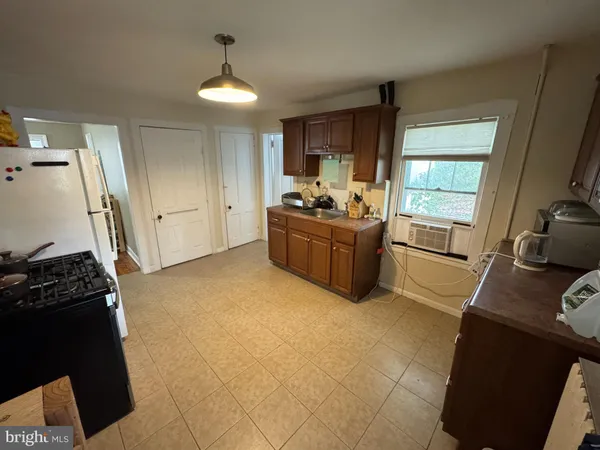 a room with furniture and a flat screen tv
