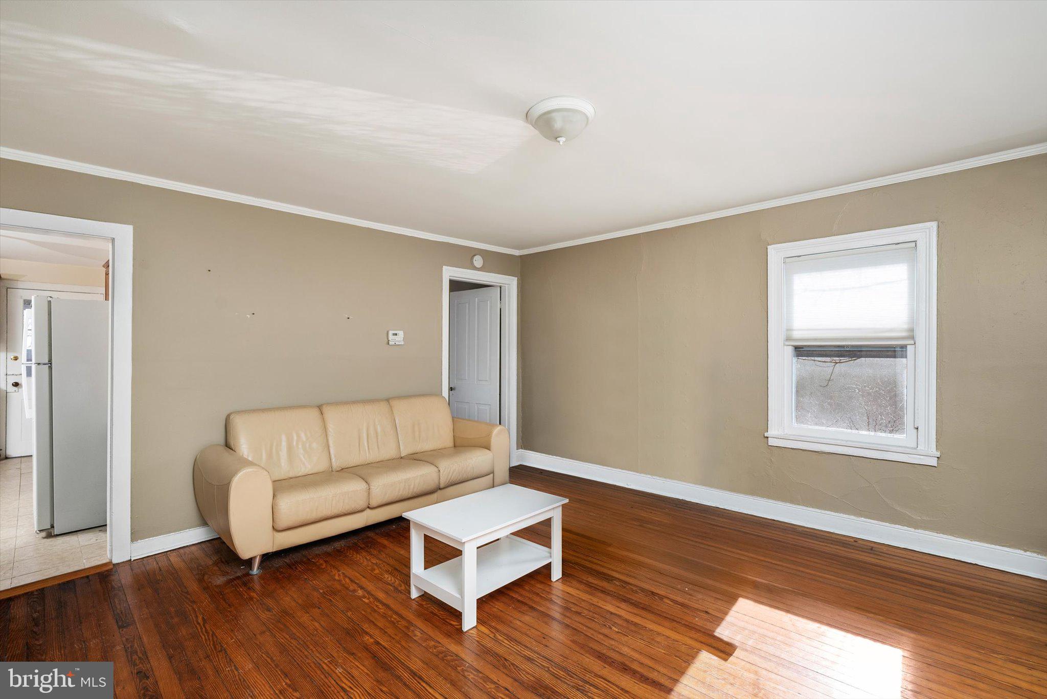 75 Patton Avenue, Unit 1 Princeton, NJ 08540 - Photo 5 of 20 a living room with couch and a wooden floor