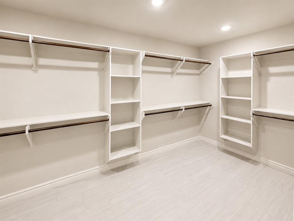 1013 Abbie Ruth Court Springtown, TX 76082 - Photo 17 of 30 Primary closet - lots of space