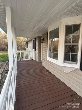 a view of a house with a wooden floor