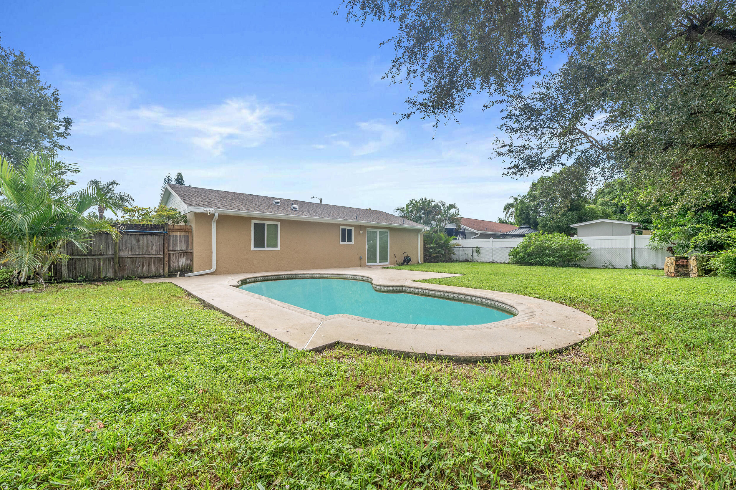 1357 Ryan Lane Royal Palm Beach, FL 33411 - Photo 16 of 23 a view of outdoor space yard and house
