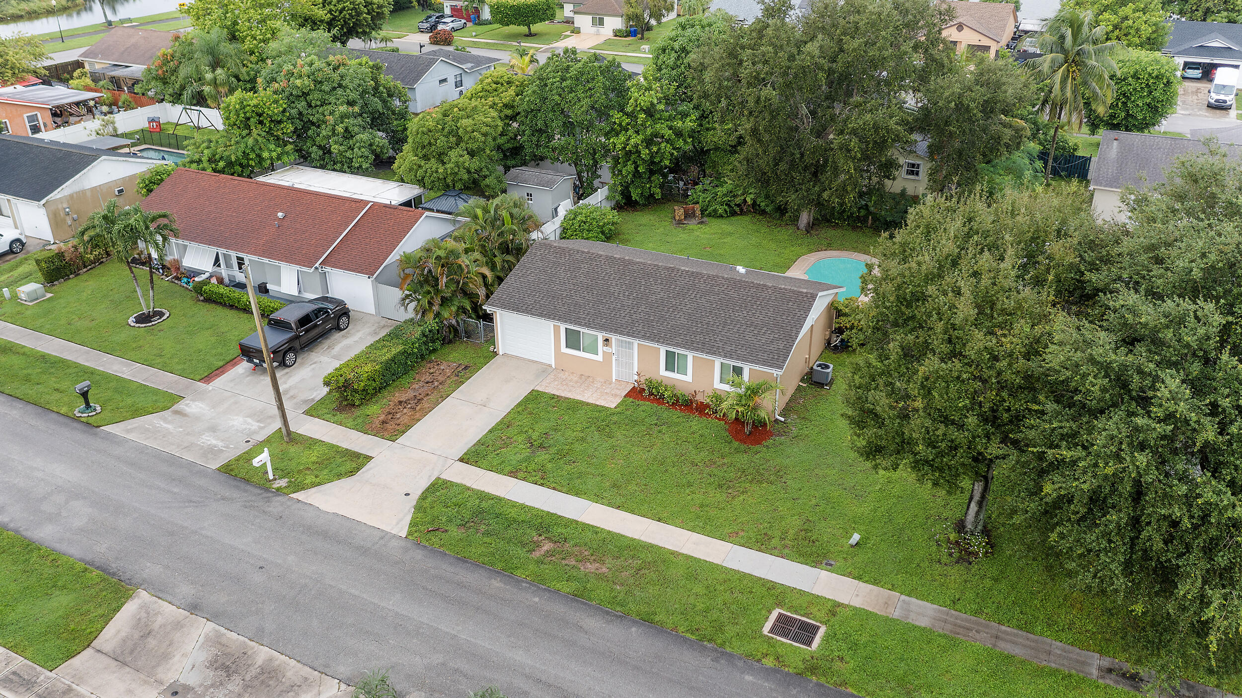 1357 Ryan Lane Royal Palm Beach, FL 33411 - Photo 21 of 23 an aerial view of a house