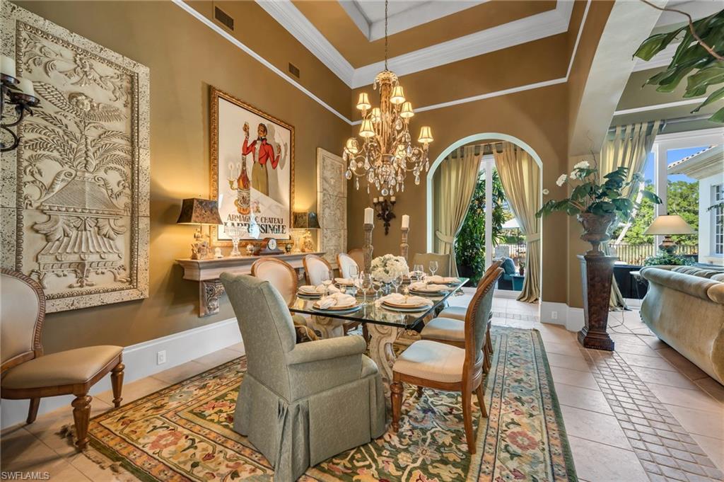 1705 Venezia Way Naples, FL 34105 - Photo 11 of 50 This Estate architecture contains abundant crown moldings throughout, and 16-foot ceilings in the dining and living rooms.