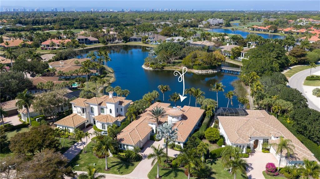 1705 Venezia Way Naples, FL 34105 - Photo 2 of 50 This residence has incredible placement within Venezia, overlooking the lake and Banyan Island, a Bird Sanctuary.