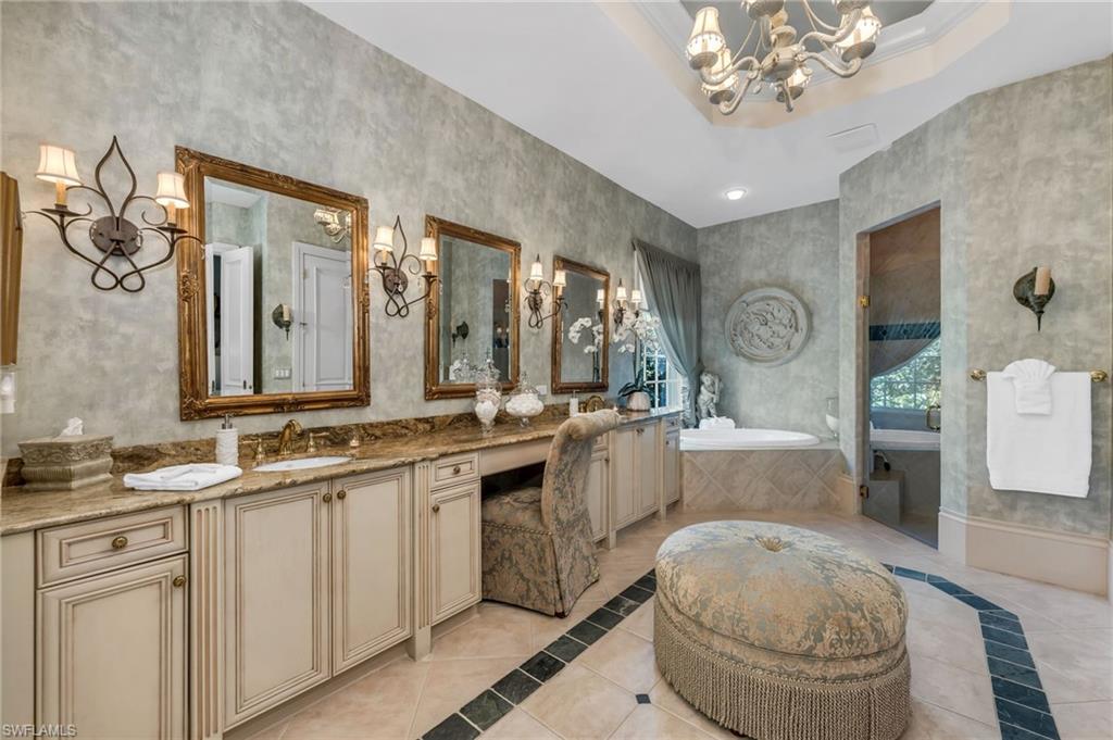 1705 Venezia Way Naples, FL 34105 - Photo 25 of 50 Large bath with double vanity, makeup area and separate water closet with bidet.