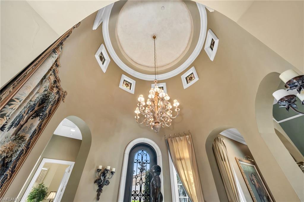 1705 Venezia Way Naples, FL 34105 - Photo 26 of 50 The main entry into the turret foyer is a stunning 23 feet tall, with stained glass inserts that can be removed.