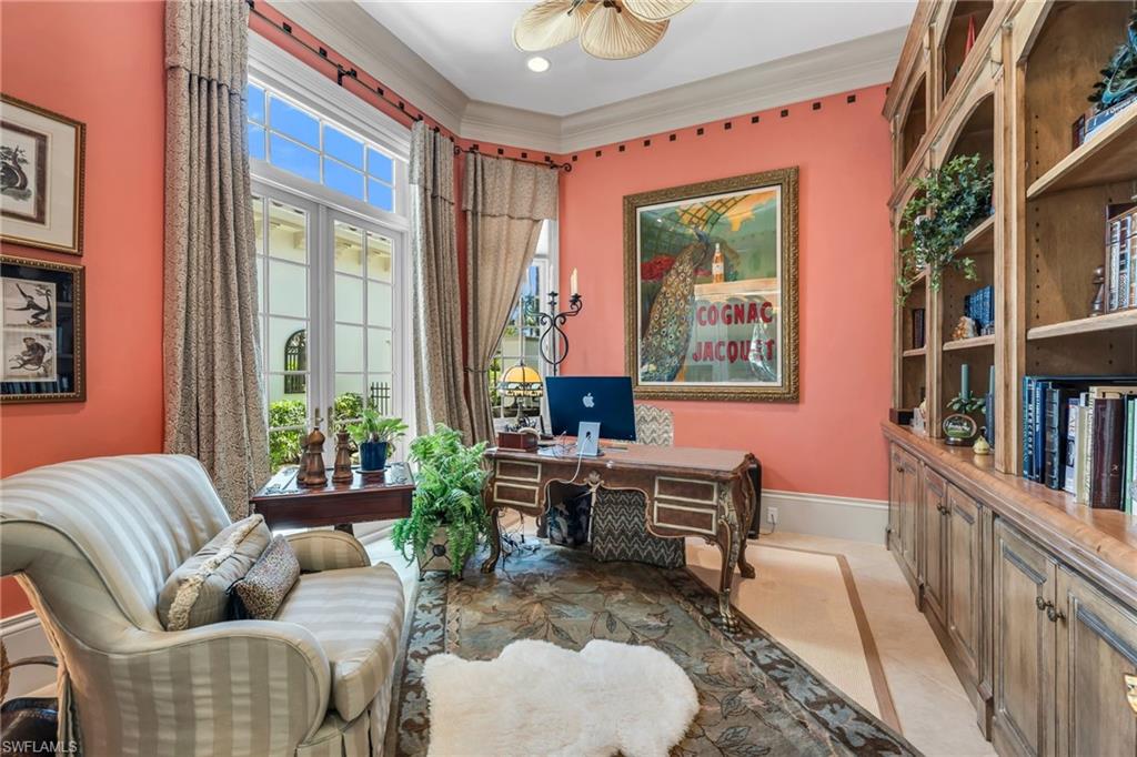 1705 Venezia Way Naples, FL 34105 - Photo 31 of 50 Office with French doors leading to an interior courtyard with fountain.