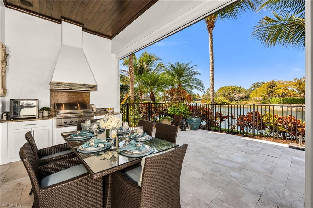 1705 Venezia Way Naples, FL 34105 - Photo 34 of 50 How about dining al fresco tonight, as the sun sets on this amazing view?