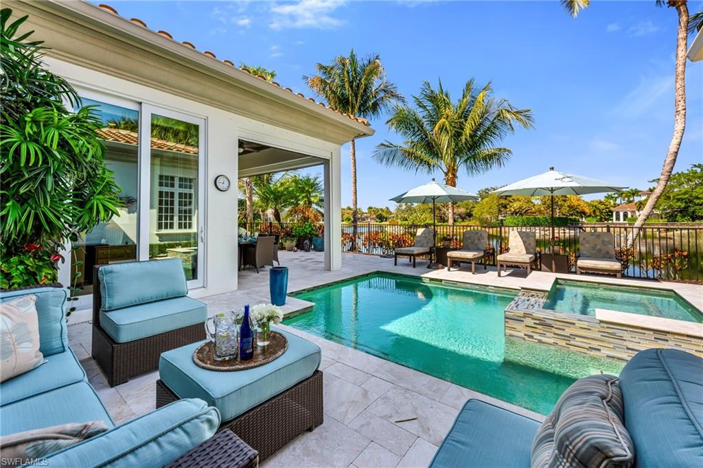 1705 Venezia Way Naples, FL 34105 - Photo 35 of 50 This relaxing view is the perfect spot for a morning coffee or an afternoon Arnold Palmer!
