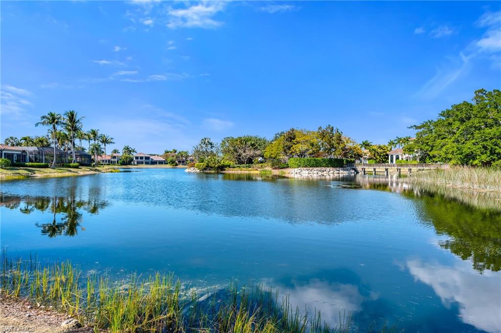 1705 Venezia Way Naples, FL 34105 - Photo 4 of 50 Complete, unobstructed views are the backdrop for your new home! The Bird Sanctuary is home to many birds and animals...and a great place to go for a walk after dinner!