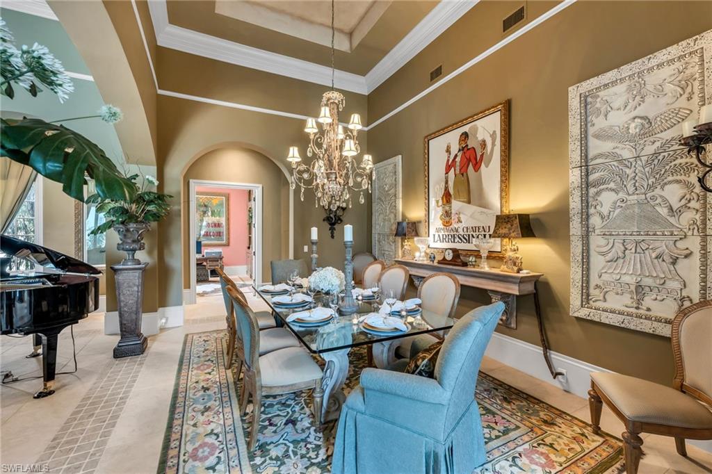 1705 Venezia Way Naples, FL 34105 - Photo 10 of 50 Imagine holidays around the table...this dining room has plenty of room for your large crowd!