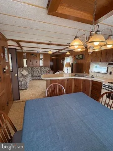 a view of a livingroom with furniture