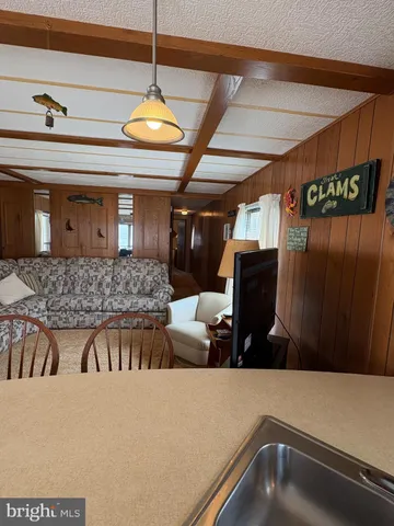 a kitchen with a refrigerator and countertop
