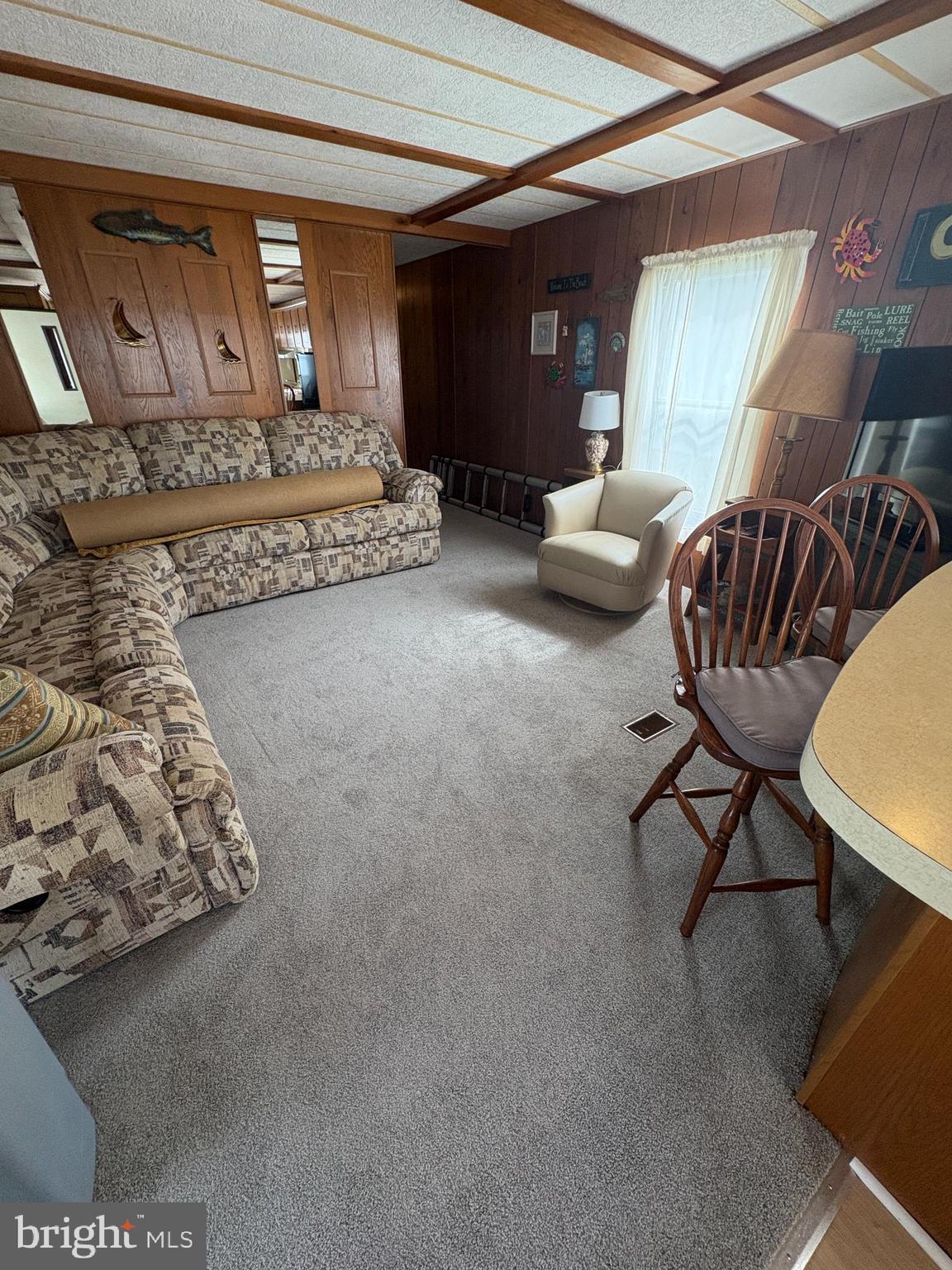 38354 Squirrel Road, Unit 19312 Ocean View, DE 19970 - Photo 7 of 39 a living room with furniture