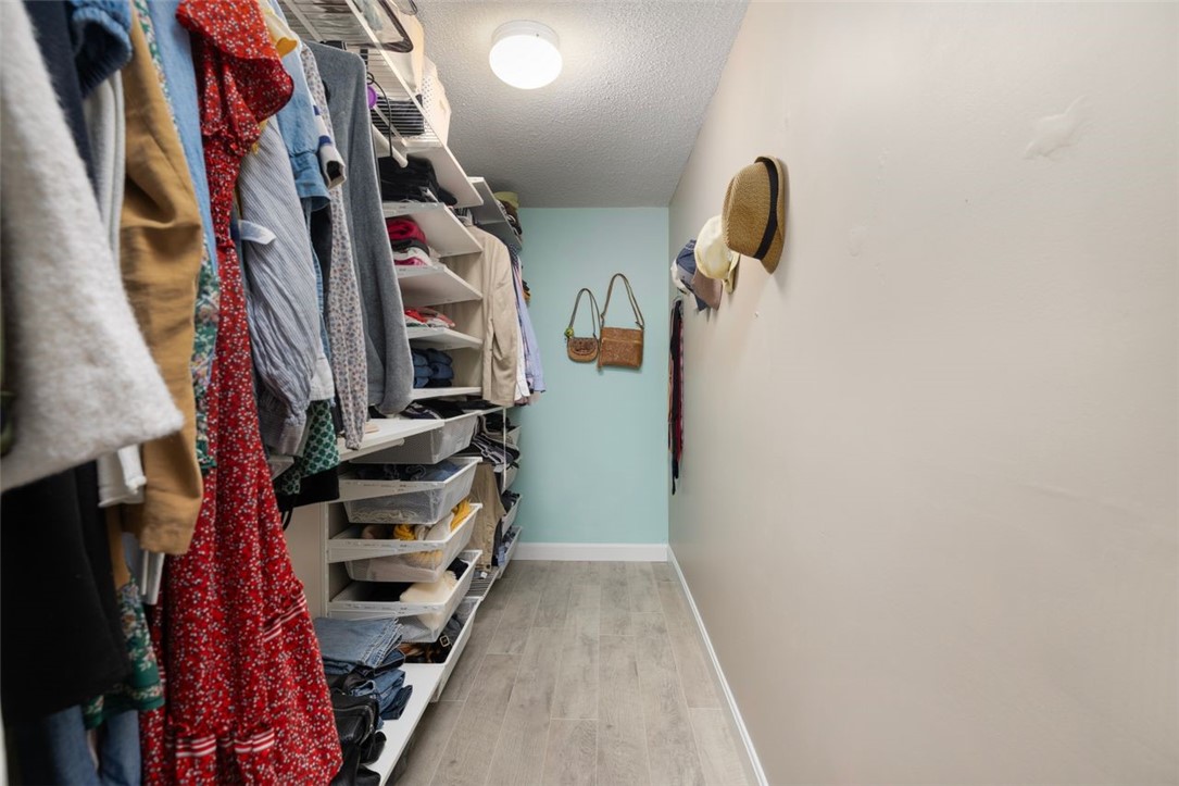 5390 Post Road, Unit 9 East Greenwich, RI 02818 - Photo 24 of 50 Walking Closet Primary Bedroom