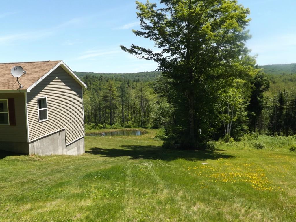 1875 Hostile Valley Road Palermo, ME 04354 - Photo 2 of 32 Side yard looking down to pond.
