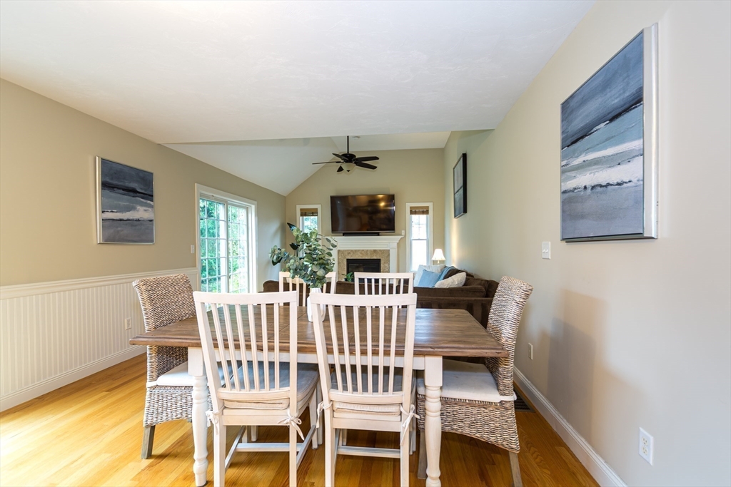 9 Flynn Street Natick, MA 01760 - Photo 14 of 36 a view of a dining room with furniture window and wooden floor