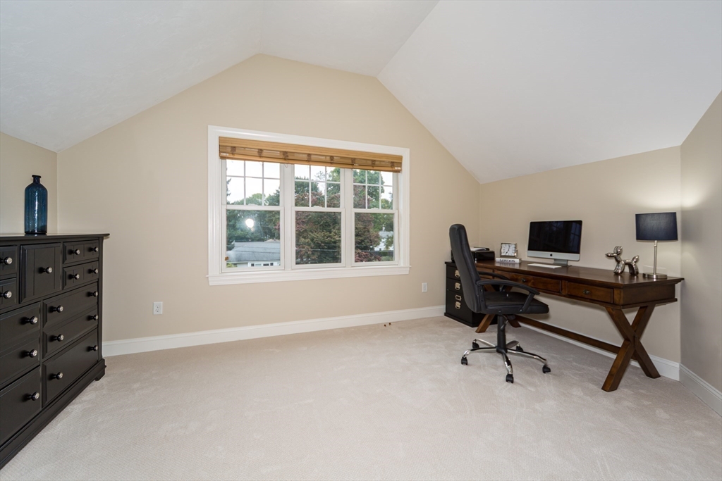 9 Flynn Street Natick, MA 01760 - Photo 19 of 36 a view of a workspace with furniture and a window
