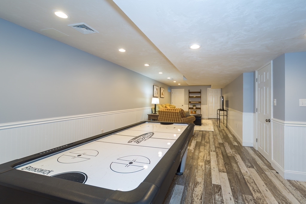 9 Flynn Street Natick, MA 01760 - Photo 29 of 36 a very nice looking dining room with a large bed