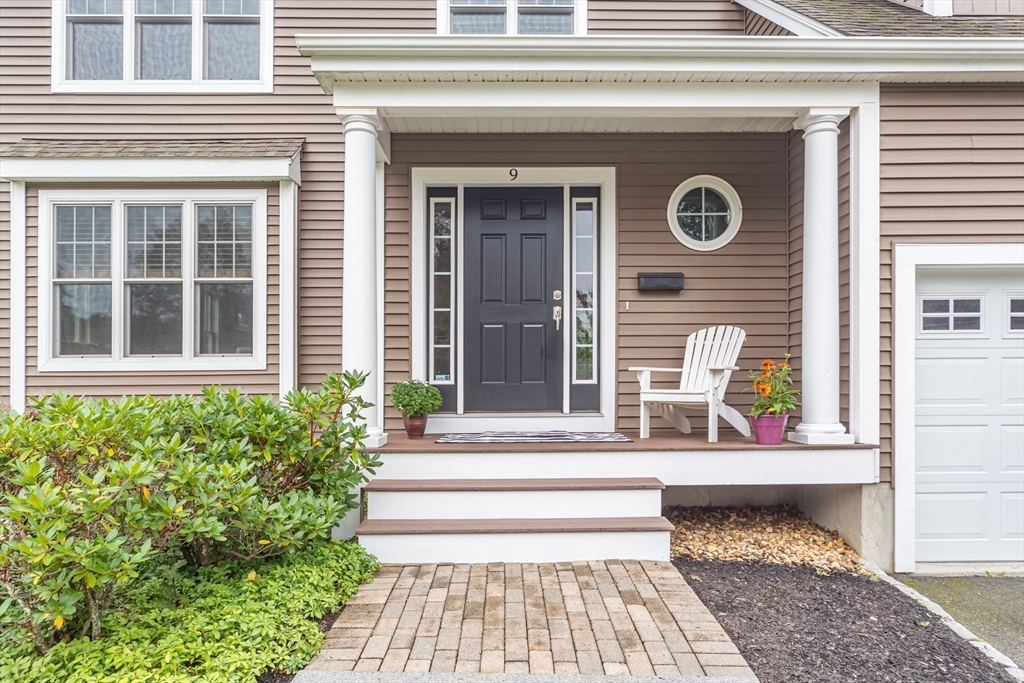 9 Flynn Street Natick, MA 01760 - Photo 3 of 36 a front view of a house with a outdoor window