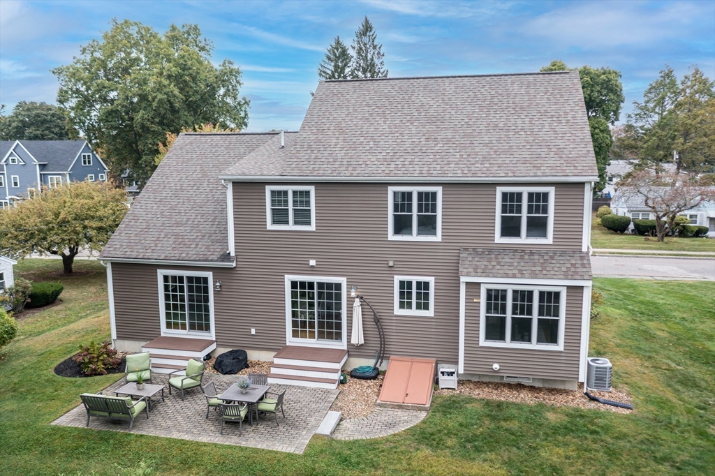 9 Flynn Street Natick, MA 01760 - Photo 32 of 36 a house that has tree in front of it