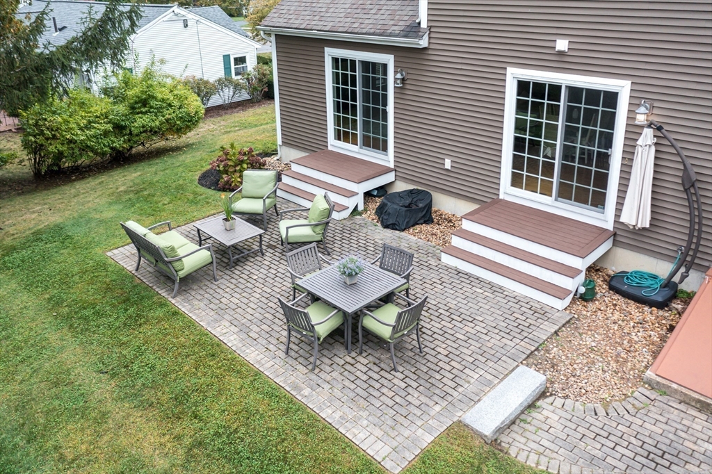 9 Flynn Street Natick, MA 01760 - Photo 33 of 36 a front view of a house with sitting area