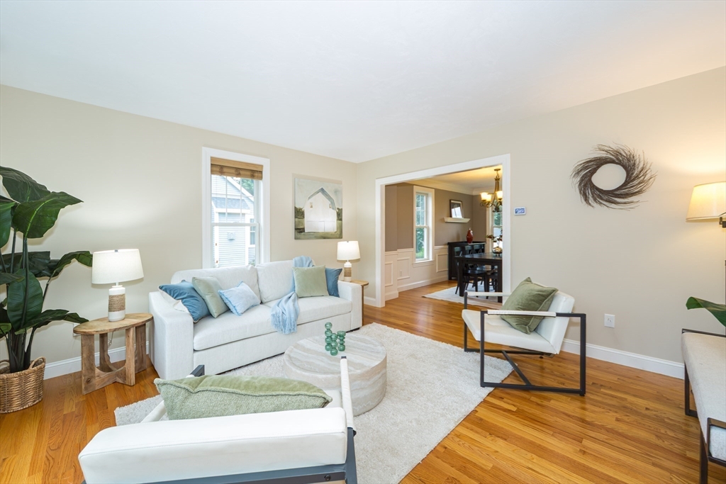 9 Flynn Street Natick, MA 01760 - Photo 5 of 36 a living room with furniture and wooden floor