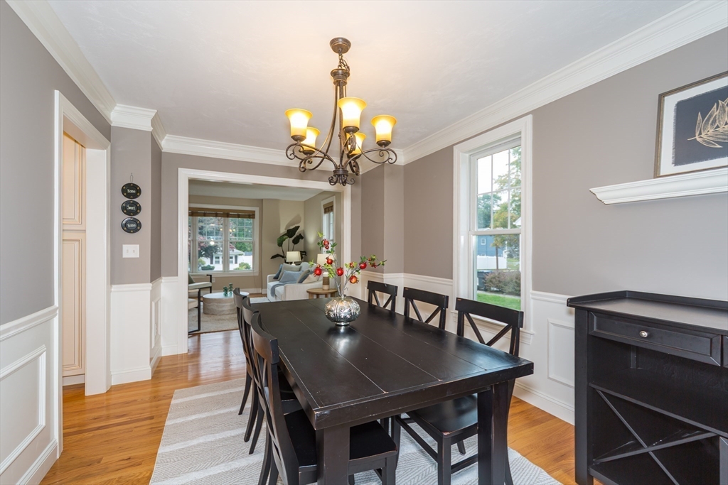 9 Flynn Street Natick, MA 01760 - Photo 9 of 36 a view of a dining room with furniture and a chandelier