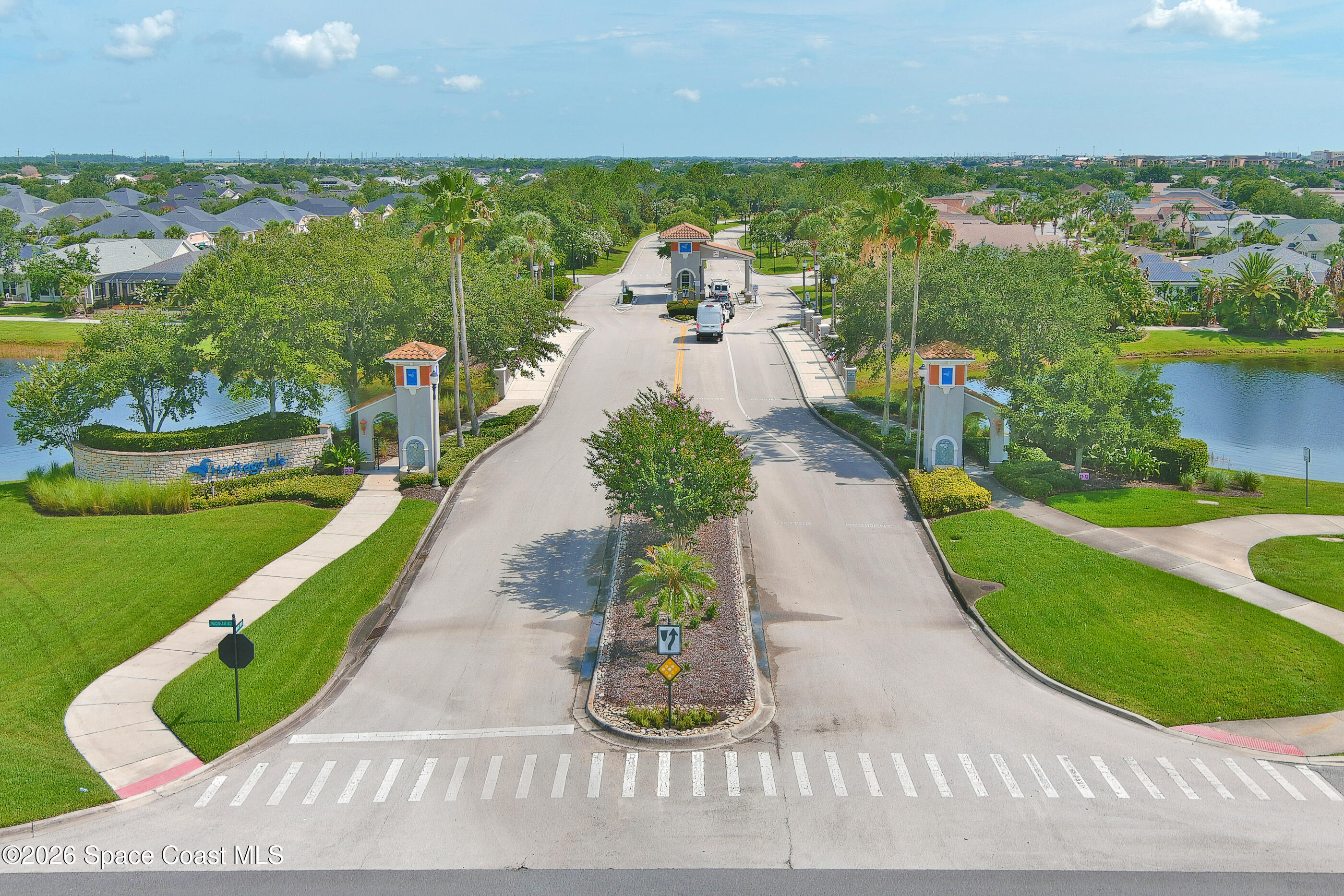 7170 Ralston Street Melbourne, FL 32940 - Photo 68 of 77 Heritage Isle Security Guard Entrance