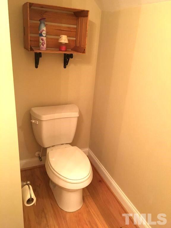 3136 La Costa Way Raleigh, NC 27610 - Photo 12 of 21 a white toilet sitting next to a white wall