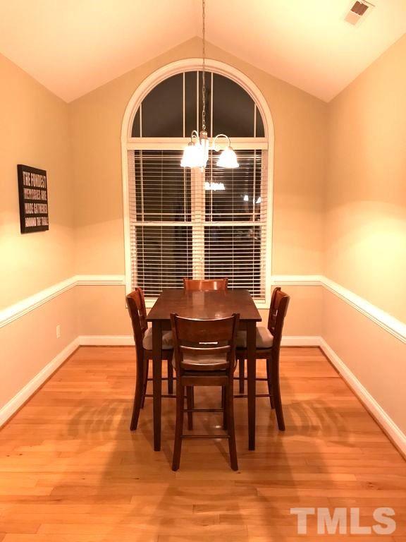3136 La Costa Way Raleigh, NC 27610 - Photo 8 of 21 a dining room with furniture and wooden floor