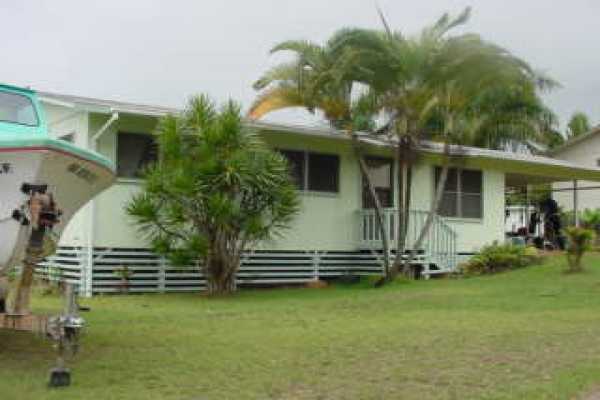 395 Eggerking Road Kapaa, HI 96746 - Photo 1 of 1 a front view of a house with a yard
