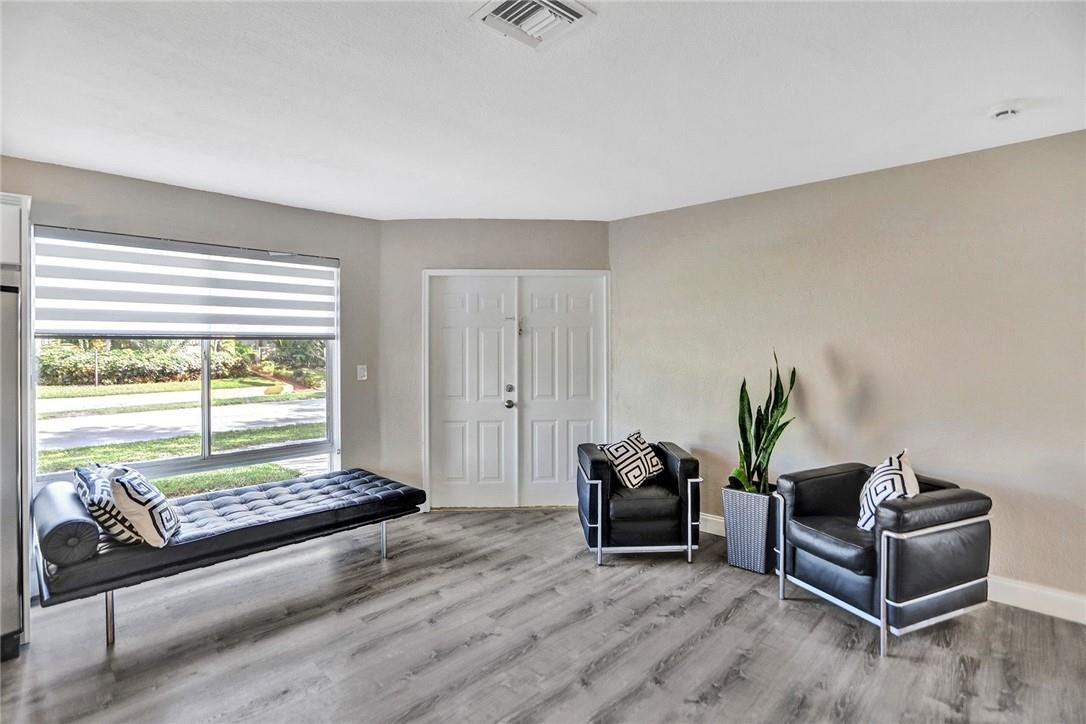 7060 Raleigh Street Hollywood, FL 33024 - Photo 3 of 25 Living Area / Entrance