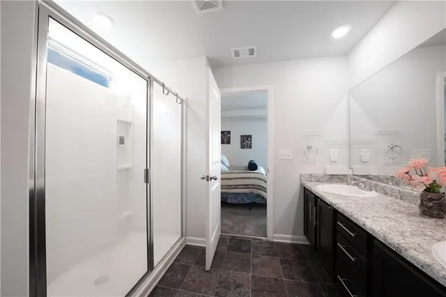 a kitchen with a sink and a refrigerator