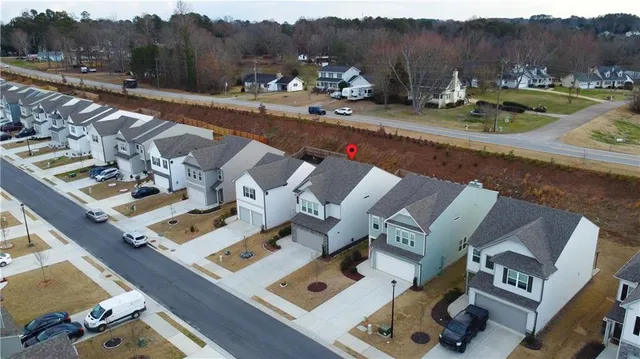 an aerial view of residential house with outdoor space