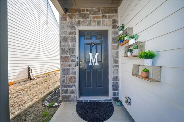 a front view of a house with entryway