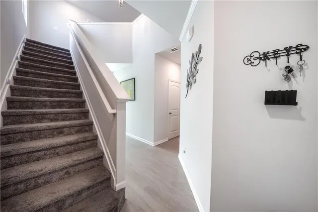 a view of an entryway with staircase