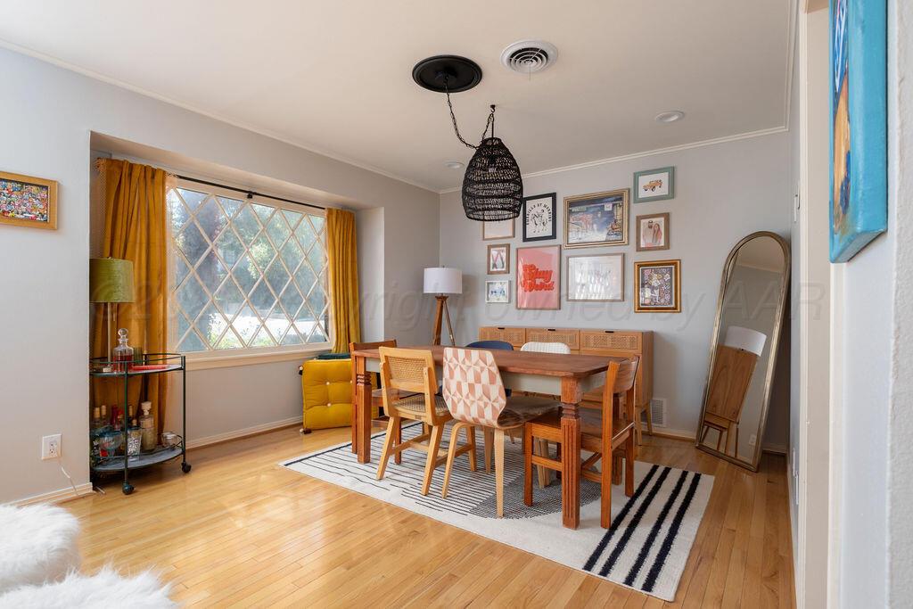 4314 Emil Avenue Amarillo, TX 79106 - Photo 11 of 44 a dining room with furniture and windows