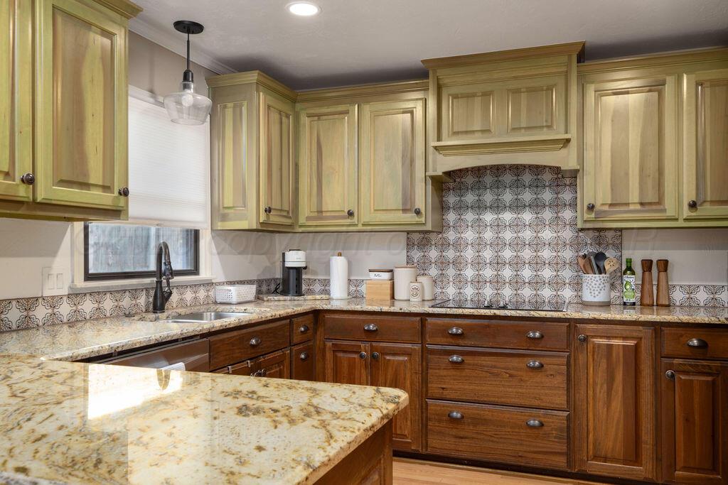 4314 Emil Avenue Amarillo, TX 79106 - Photo 14 of 44 a kitchen with a sink and cabinets