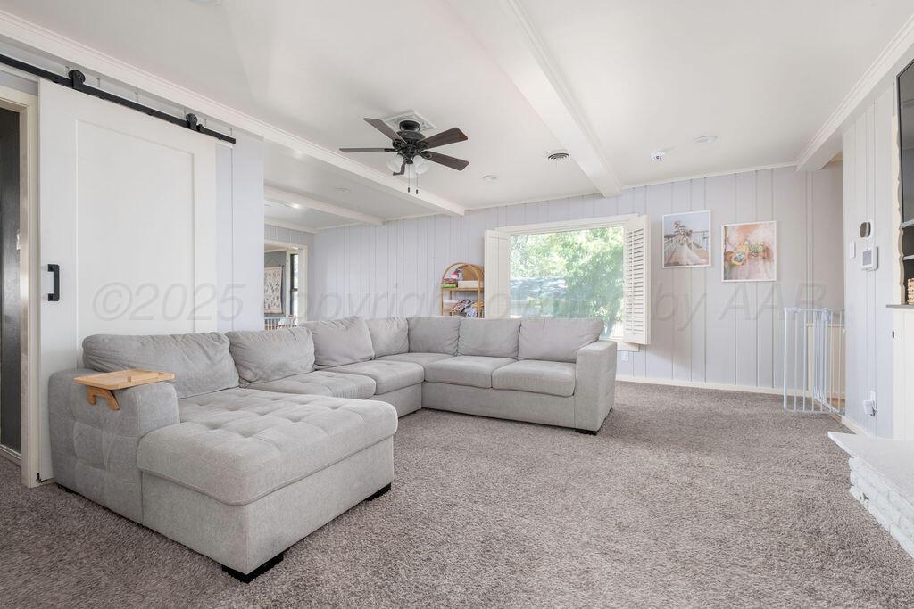 4314 Emil Avenue Amarillo, TX 79106 - Photo 19 of 44 a living room with furniture and a large window