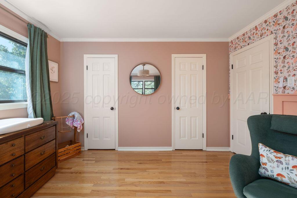 4314 Emil Avenue Amarillo, TX 79106 - Photo 33 of 44 a view of room with furniture and wooden floor