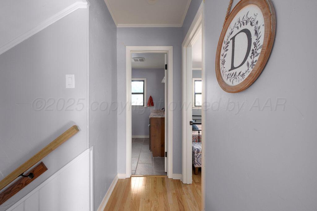 4314 Emil Avenue Amarillo, TX 79106 - Photo 34 of 44 a view of a hallway with entryway wooden floor