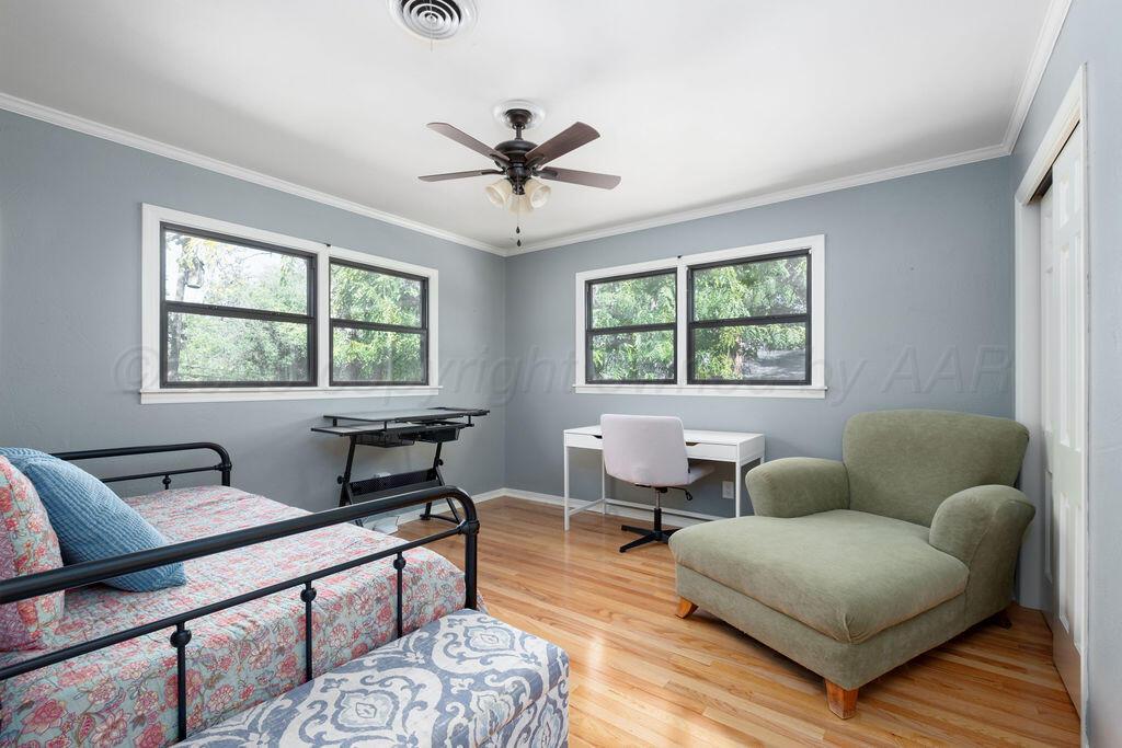 4314 Emil Avenue Amarillo, TX 79106 - Photo 37 of 44 a living room with furniture and a window