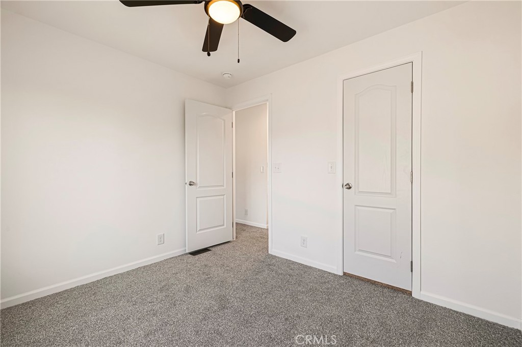5352 Sawmill Road Paradise, CA 95969 - Photo 19 of 23 an empty room with chandelier fan