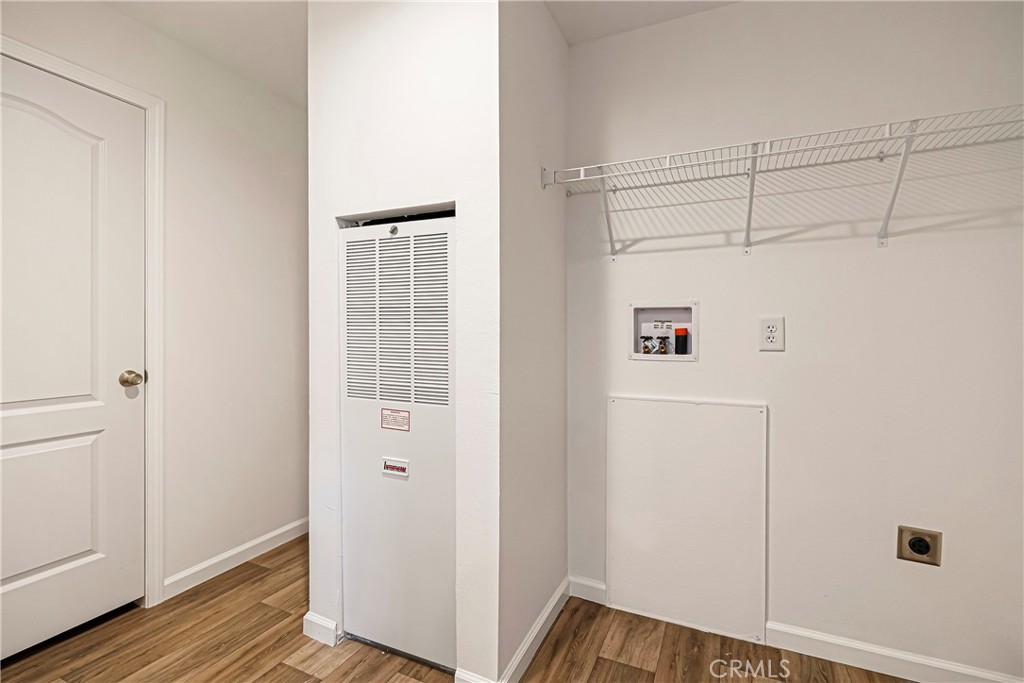 5352 Sawmill Road Paradise, CA 95969 - Photo 23 of 23 a view of a closet with wooden floor