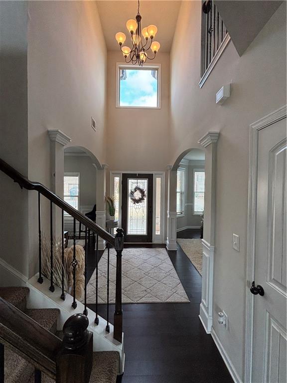 3459 In Bloom Way Auburn, GA 30011 - Photo 15 of 35 a view of entryway and hall with wooden floor