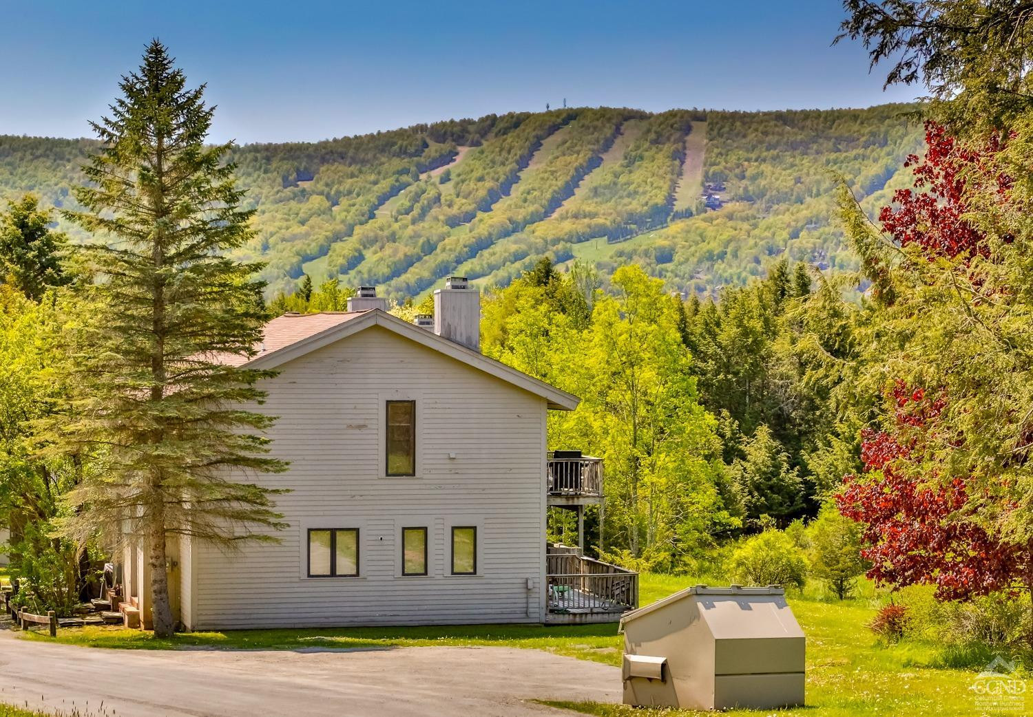 28-1 Loo Bridge Lane, Unit 22A Windham, NY 12496 - Photo 33 of 35 a view of a house with a yard