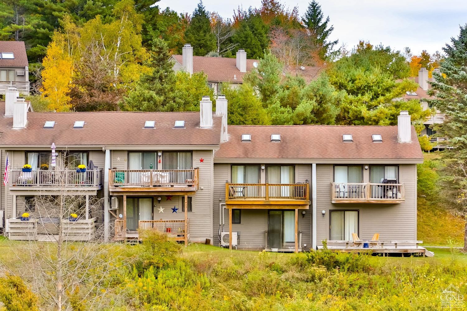 28-1 Loo Bridge Lane, Unit 22A Windham, NY 12496 - Photo 35 of 35 a view of a building with a swimming pool