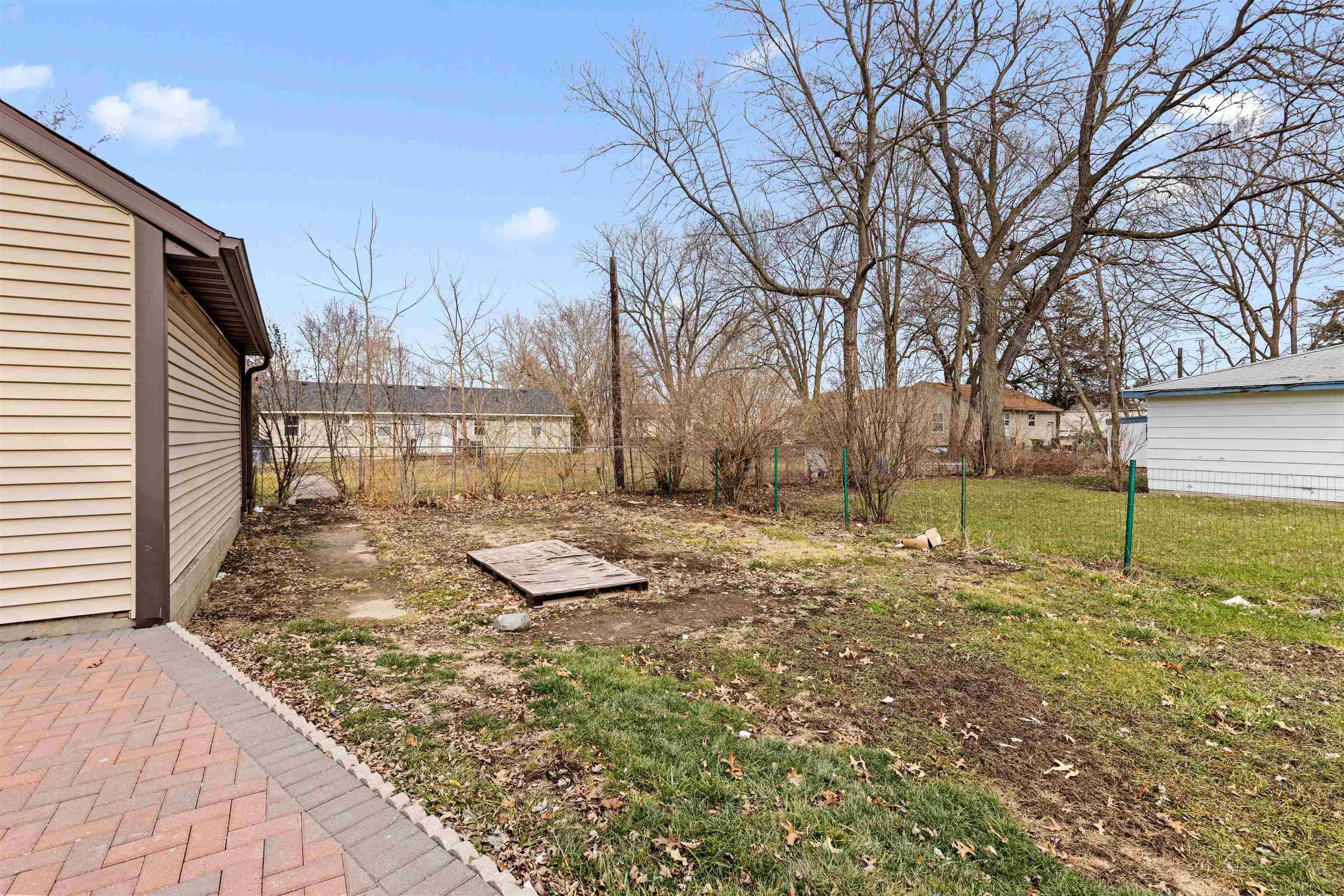 1214 Samuelson Road Rockford, IL 61109 - Photo 13 of 15 a view of a backyard of the house